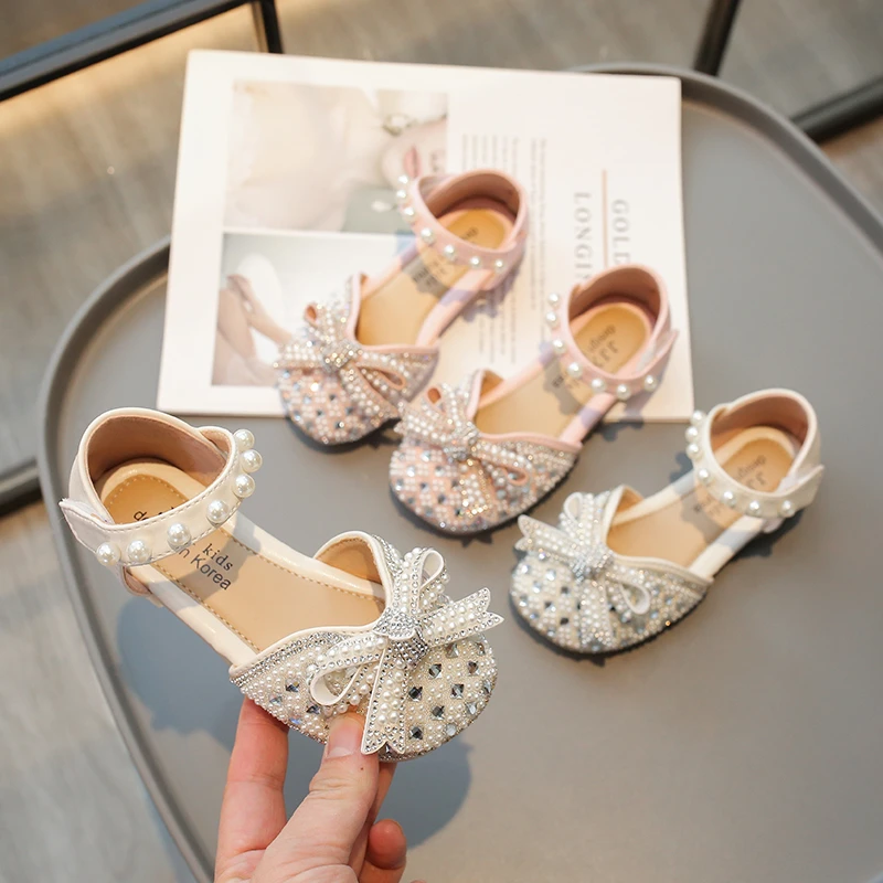 

Girls 2024 Summer New Baotou Sandals Crystal Water Diamond Performance Shoes Performance Soft Sole Children's Shoes 899