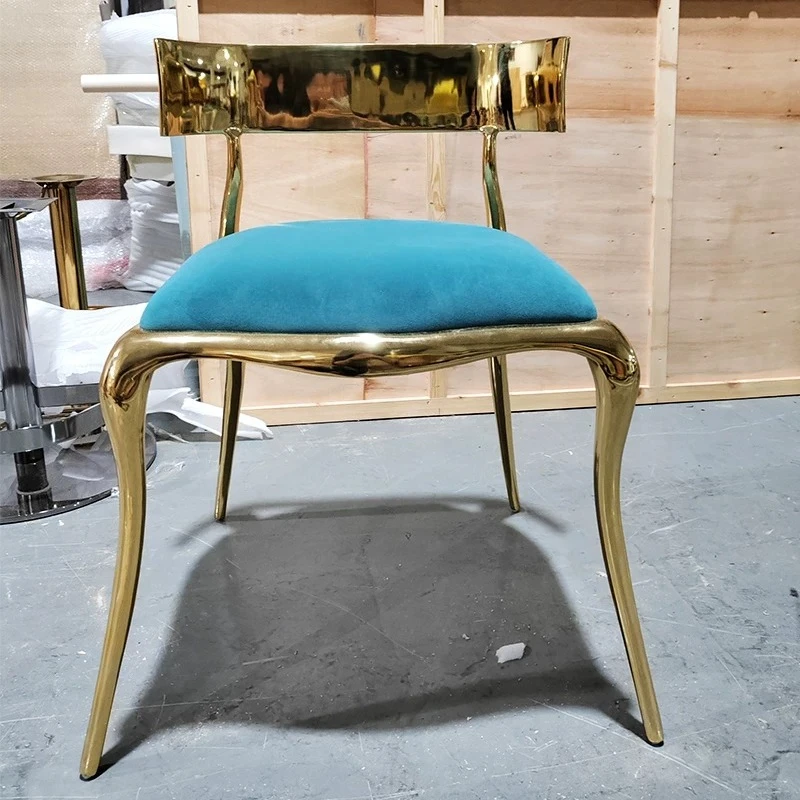 

Light luxury dining chair high-end special-shaped creative simple leisure chair design modern home Italian backrest pure copper