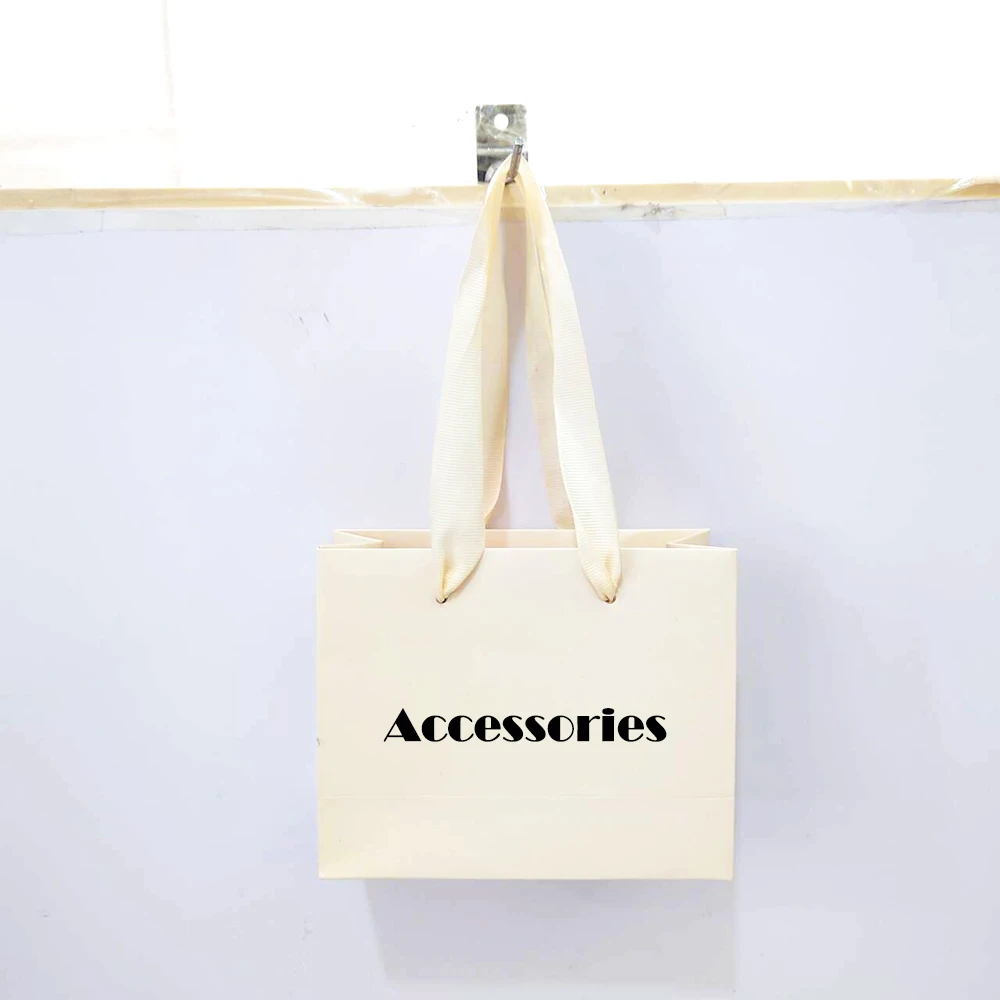 Venta al por mayor, 500 unids/lote, bolsas de compras de papel de lujo de alta gama con mango de cinta, personaliza tu propio logotipo impreso para joyería de mujer