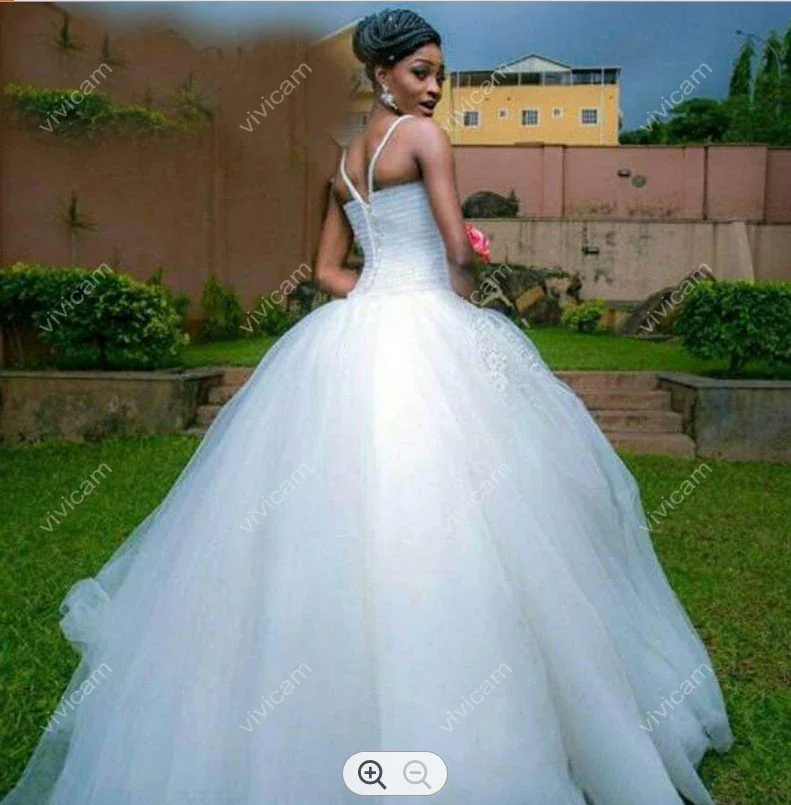 Abiti da sposa personalizzati con cinturino per spaghetti Robe De Mariage Sweep Train Pieno di perle che borda abiti da sposa per ragazze nere