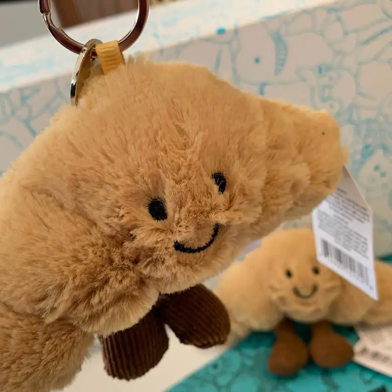 

Jellycat Adorable Croissant Bag Charm Keychain Perfect Novelty Gift for Food Lovers Cute Accessory for Bags and Mobile Phones