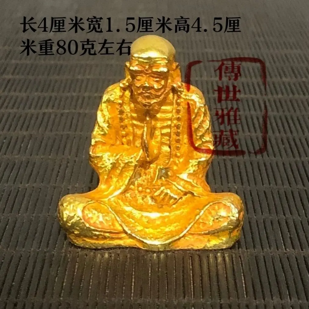 Three dimensional bronze statue of Bodhidharma Patriarch Buddha, representing tea ceremony and Zen philosophy