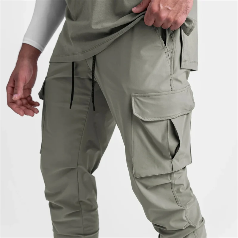 Calças esportivas multibolso masculinas, calças de ginástica, streetwear, calças de ginástica ao ar livre, roupas elásticas na moda, novo, 2024