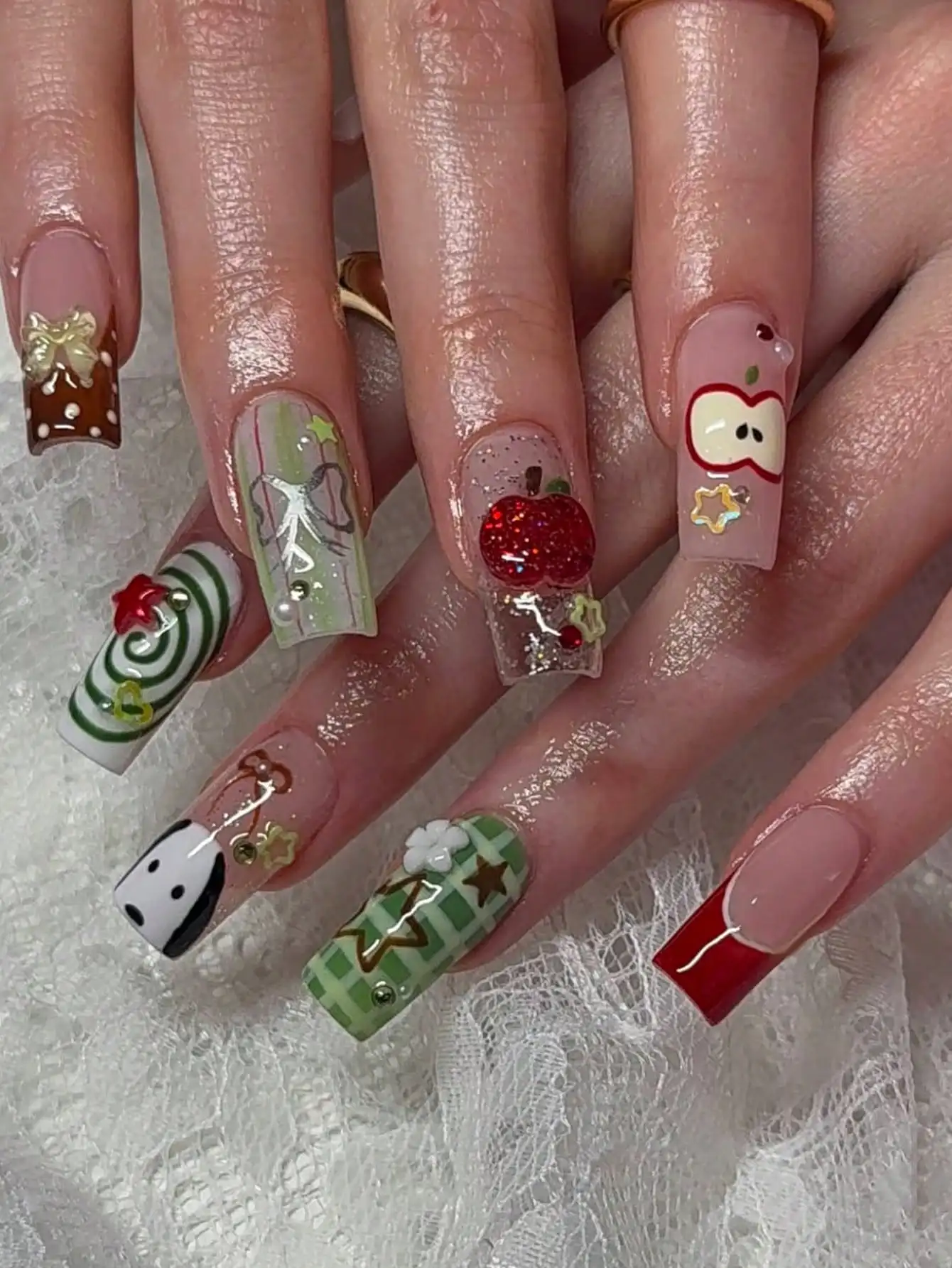 

24pcs Rectangular Nail Stickers Gift Box, Spring Tones, Leaf, Grass, Green Checkerboard, Handpainted Cute Dog, Glitter Red Apple, 3D Pentagram, Hollow Colorful Solid Stars, Sequin Hearts, Bright Yellow Bow, Yellow Starfish, Polka Dots, Summer Beach Party