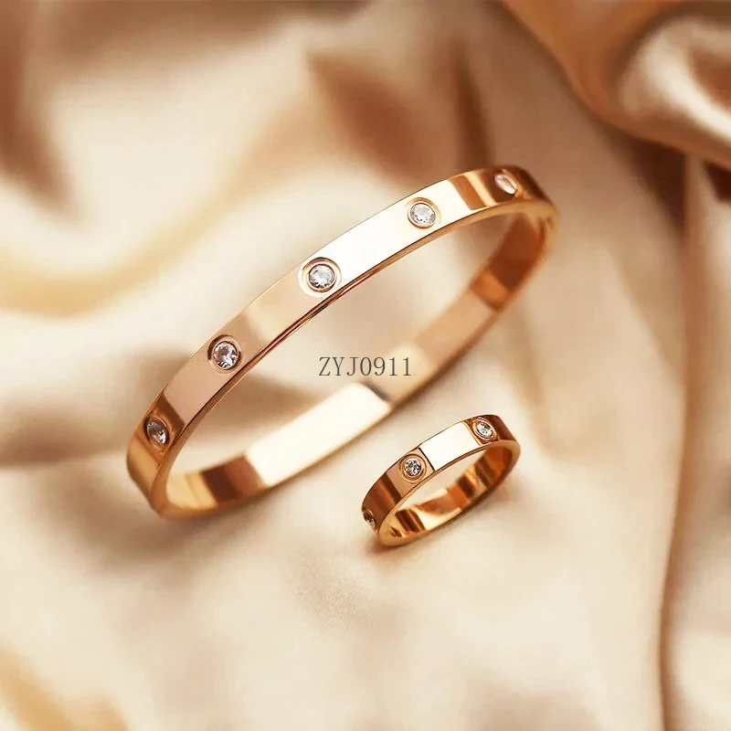 女性用ステンレススチールブレスレット,ゴールドカラーのキュービックジルコニアジュエリー,防水,1セット