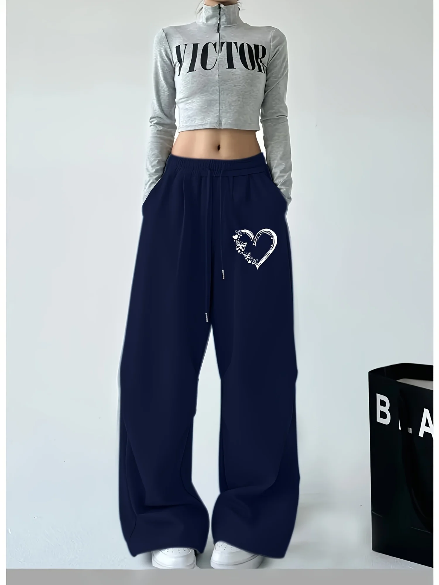 Damen Herbst und Winter Plus-Size-Herzdruck Lose gerade Fleece-Bein-Jogginghose Elastischer Bund Streetwear Vielseitig