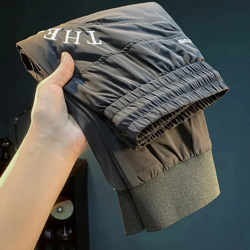 

Ultra thin ice silk quick drying casual pants for men in the summer of 2026, new leg binding elastic waistband sports