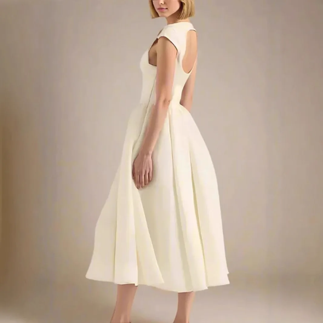 2025 Primavera estilo francês puramente sensual vestido evasê definido na cintura sem mangas com design recortado nas costas