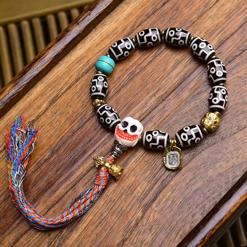 

Natural black and white nine-eyed dzi bead bracelet nanhong onyx obsidian bravery glaze a dull reflux bone accessories strings