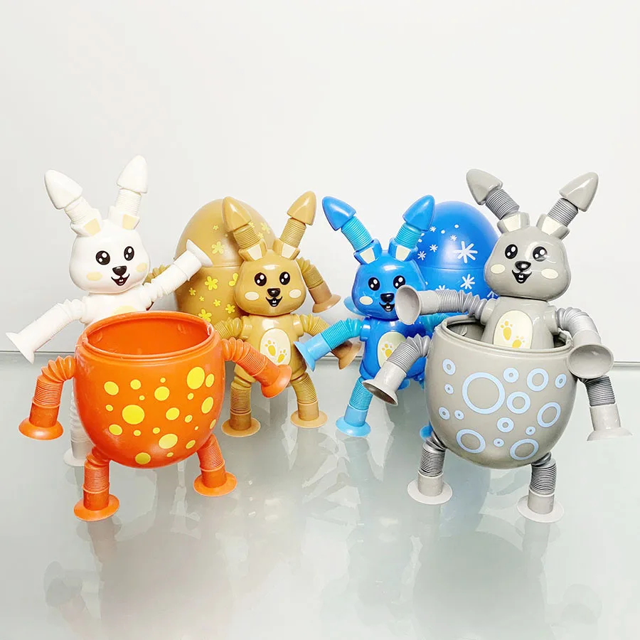 吸盤付きのマルチカラーの小さなウサギのおもちゃとチューブ引きのおもちゃはストレス解消に最適です。 装飾品として使用できます。