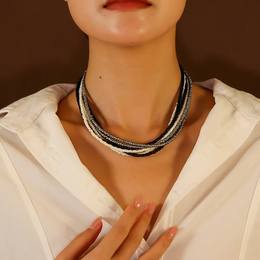 

Bohemian Fashionable ethnic style multi-layer rice bead necklace mixed color short layer bead suitable for girls' daily wear