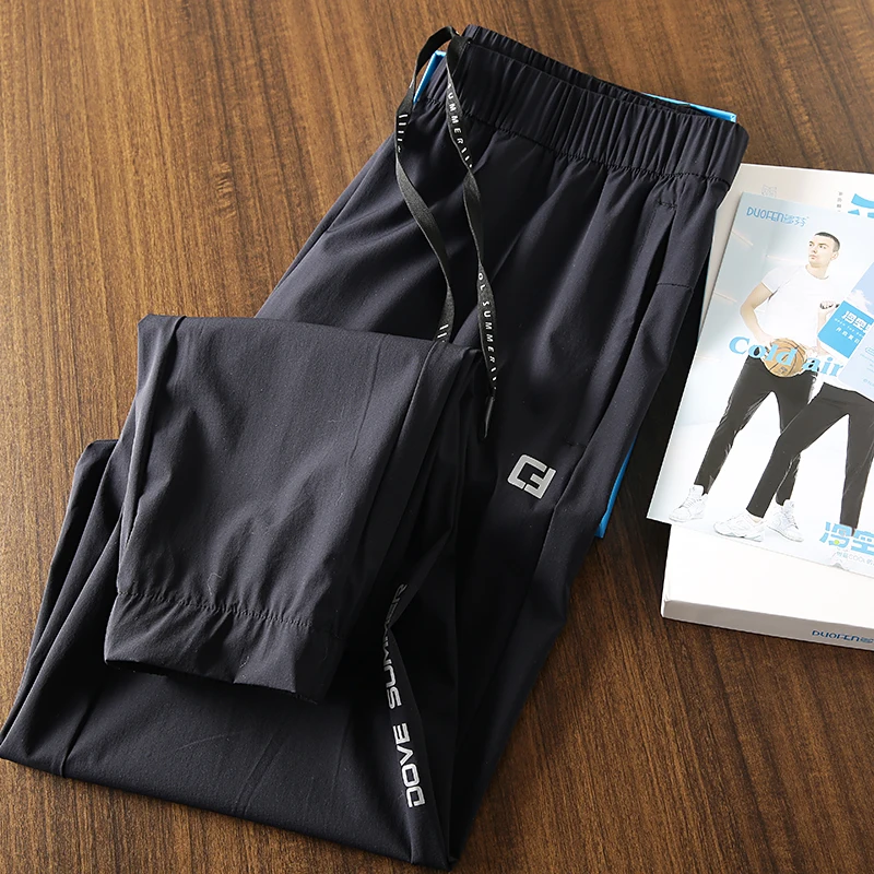 

Ice Silk Qui Dry Elastic Breathable Sports Leisure Pants Boxed Summer Cold Air Sensation Material Technology Loose Fit Long...