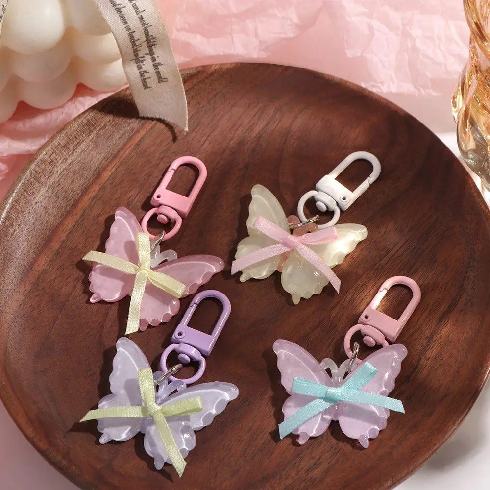 Kawaii الحلو فراشة المفاتيح لطيف الراتنج هلام عقد بحلية متدلية على شكل فراشة Bowknot الوردي الشريط القوس كيرينغ مفتاح السيارة قلادة