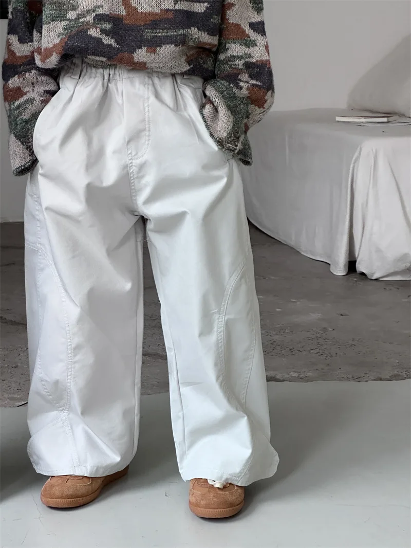 سراويل الأطفال للربيع والخريف النسخة الكورية الجديدة سراويل فضفاضة غير رسمية متعددة الاستخدامات يومية بلون سادة متعددة الاستخدامات