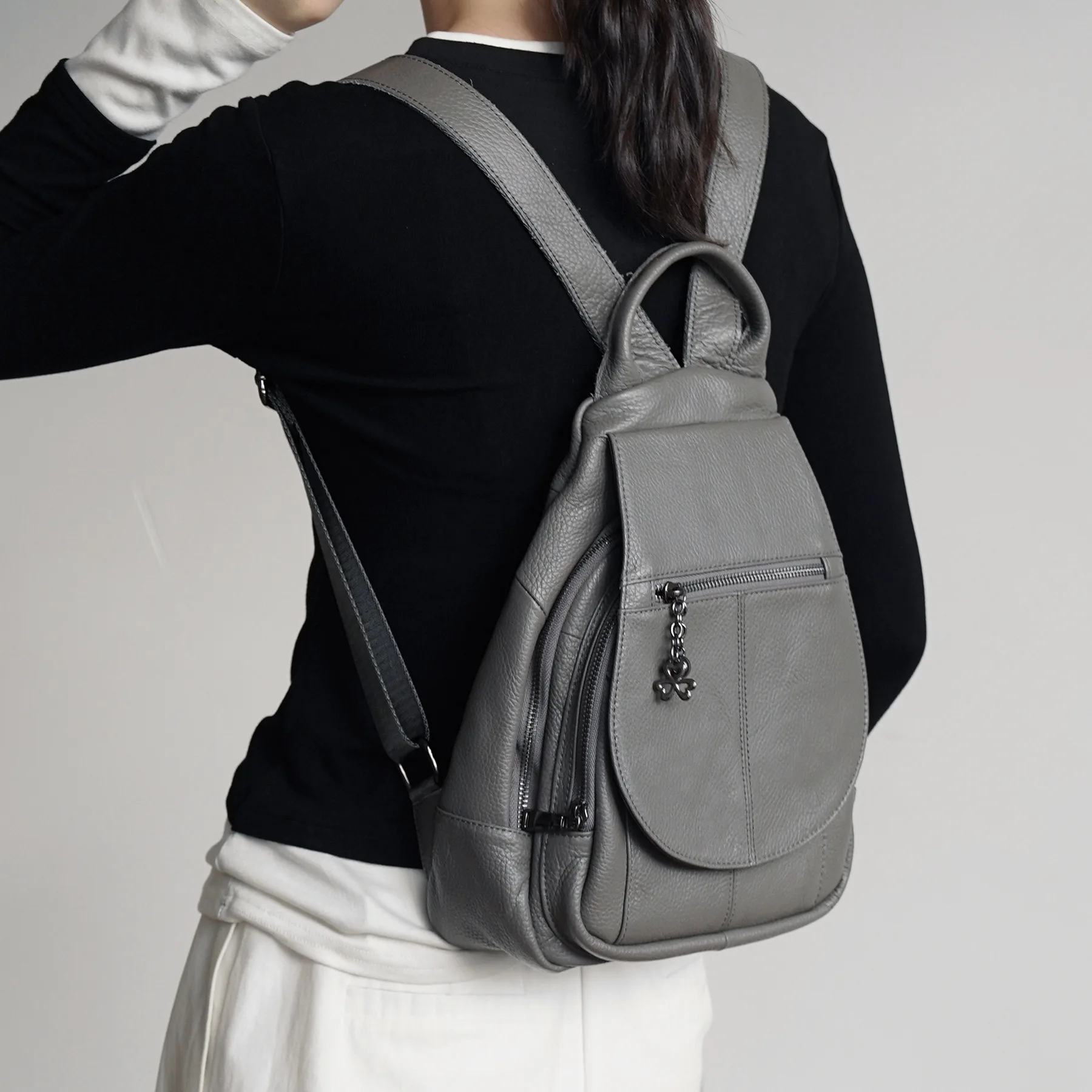 Genuine leather ladies' small backpack, casual commuting backpack, flip cover multi-functional hand-held backpack