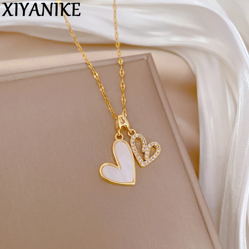 XIYANIKE 316L Stainless Steel Shell Crystal Hollow Out Heart Double Pendant Necklace For Women Creative Romantic Clavicle Chain