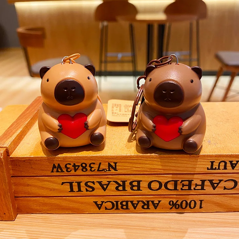 520การ์ตูนน่ารัก capybara Hug Love with Light Sound keychain ของเล่นเปล่งที่ห้อยไฟ