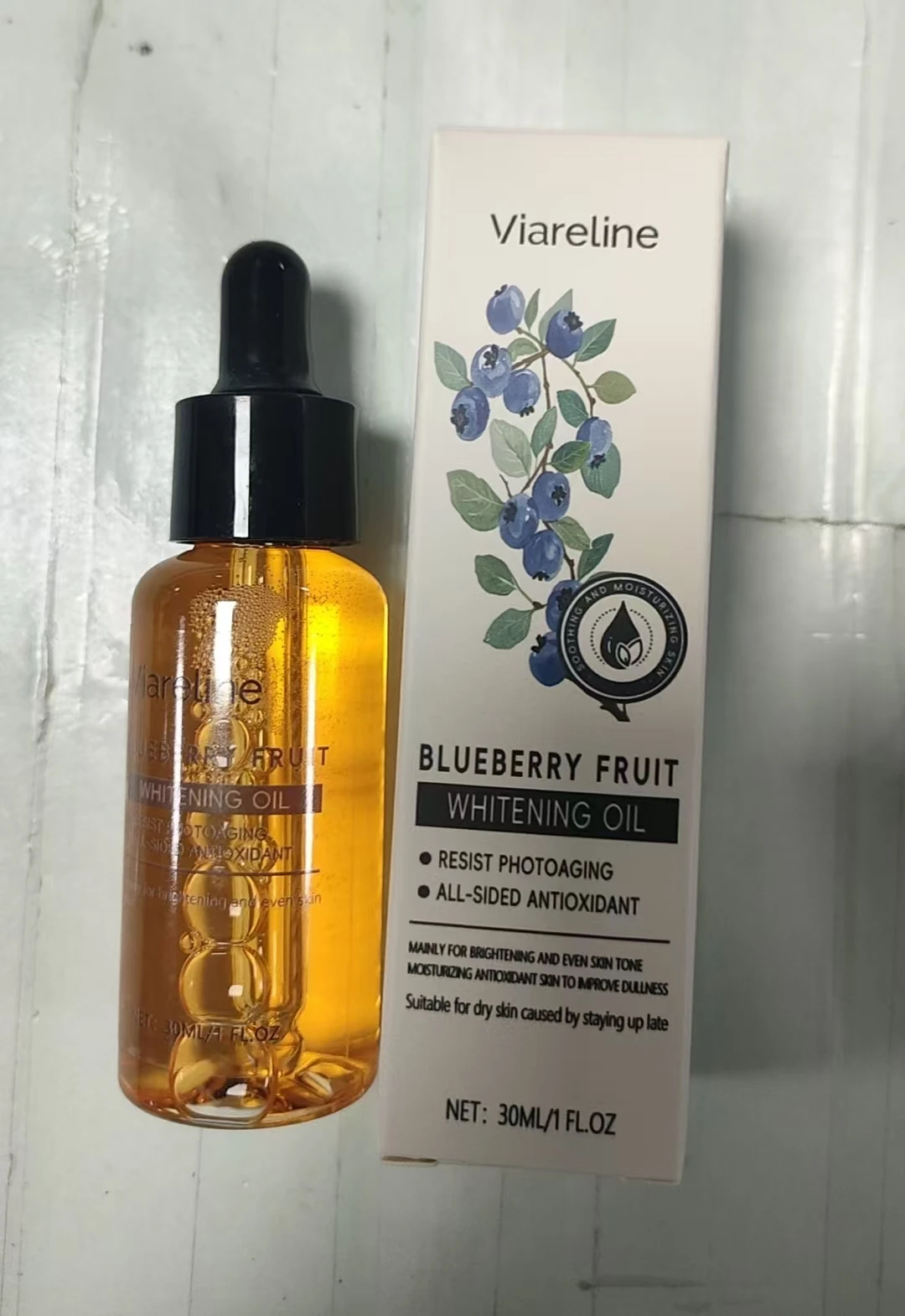 Aceite de esencia de arándano aceite de esencia para el cuidado de la piel iluminador, hidratante e hidratante