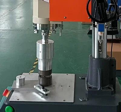 Ultrasonic welding machine welding plastic nozzle barrel cover