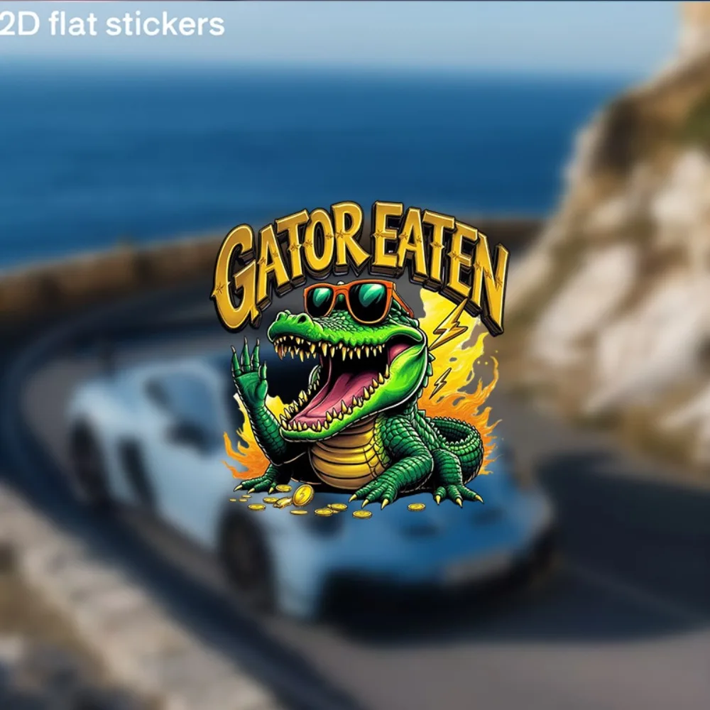 

Flat Glossy Sticker Featuring an Alligator And The Phrase 'GATOR EATEN' with a Golden Highlight Shiny Design Suitable for
