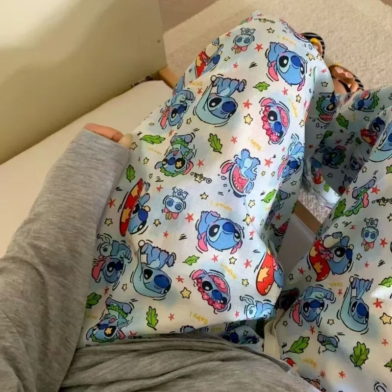 Pantalones Lilo & Stitch, pantalones Kawaii con estampado de dibujos animados de Disney, pijamas portátiles Out Joker, ropa para el hogar, regalos navideños para niños