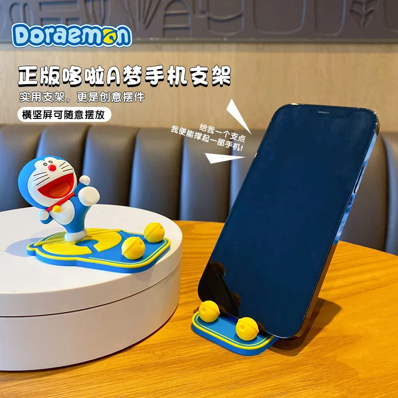 Kawaii Doraemon Mobile Phone Holders Cartoon Animation Doraemon Kicks Desktop Ornaments Decoration Gifts Mobile Phone Holders