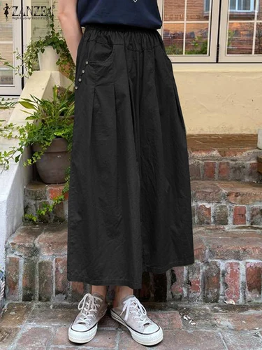Imagen 2 del producto ZANZEA-pantalones recortados con bolsillos lisos para mujer, pantalones largos de pierna ancha, pantalones con cintura elástica para vacaciones, pantalón informal holgado y plisado