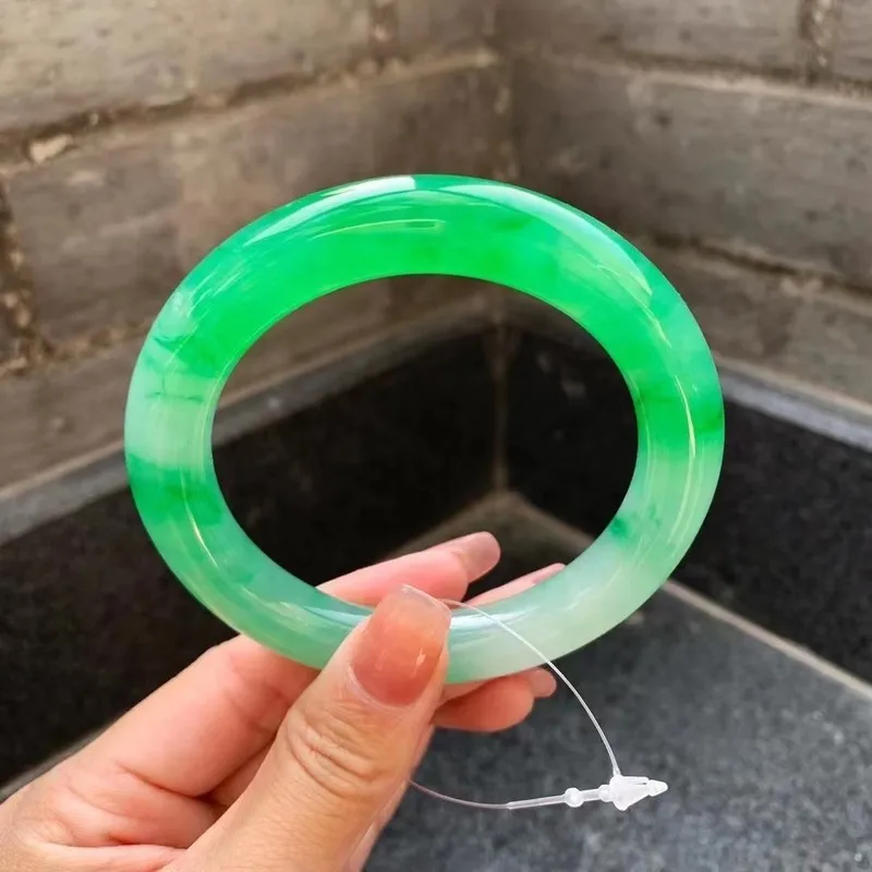 Natural Burmese jade bracelet, grade A, from an old mine, with high-quality ice-like translucency, featuring a patterned design,