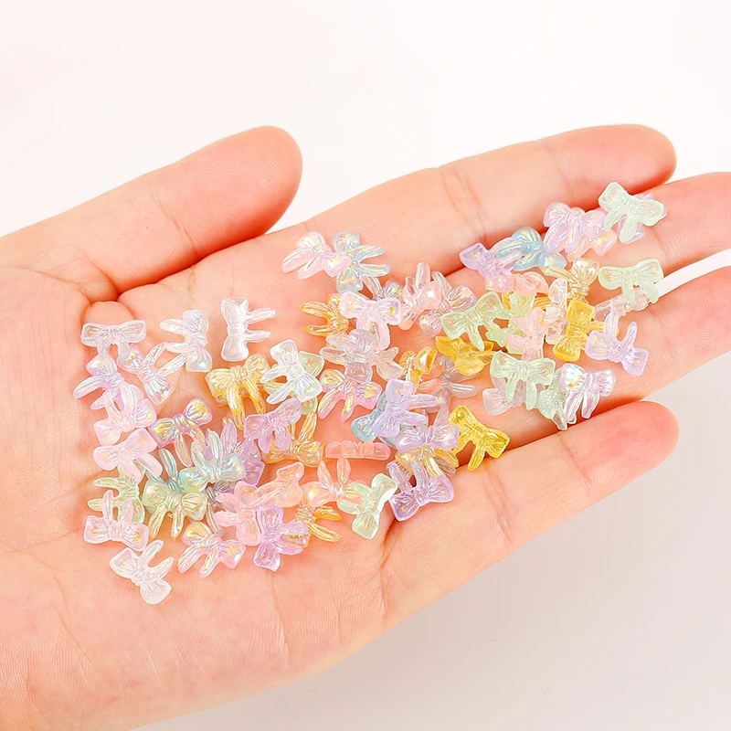 100Pcs Aurora Bow Nail Charms Mixed Color AB Resin Bows Nail Art Charms Long Tail Designs Resin Bow-Knot Nail Rhinestones