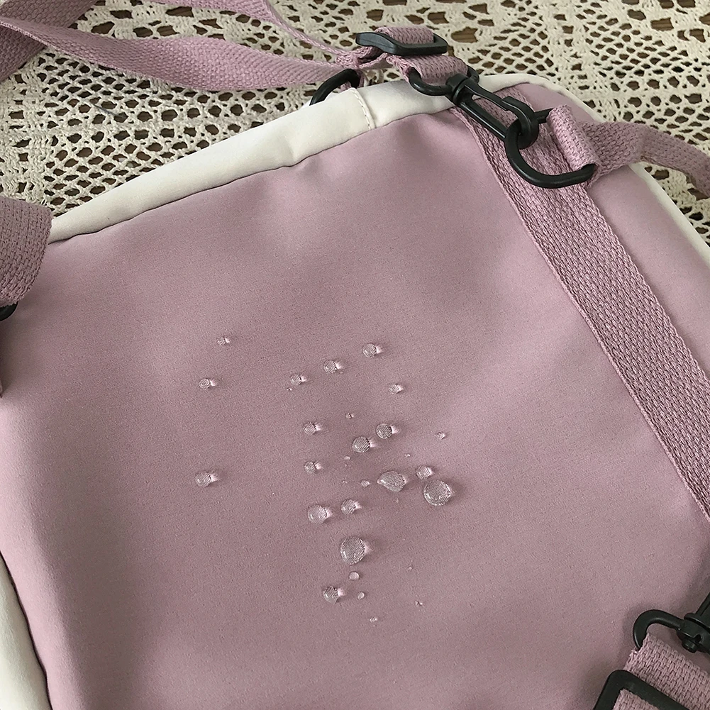 กระเป๋าเป้แฟชั่นลำลองสไตล์คาวาอี้ พร้อมเข็มกลัดและอุปกรณ์ตกแต่งน่ารัก สำหรับใส่แล็ปท็อป ขนาด 10.23x9.44x3.54 นิ้ว เหมาะสำหรับเป็นของขวัญสำหรับกิจกรรมกลางแจ้ง