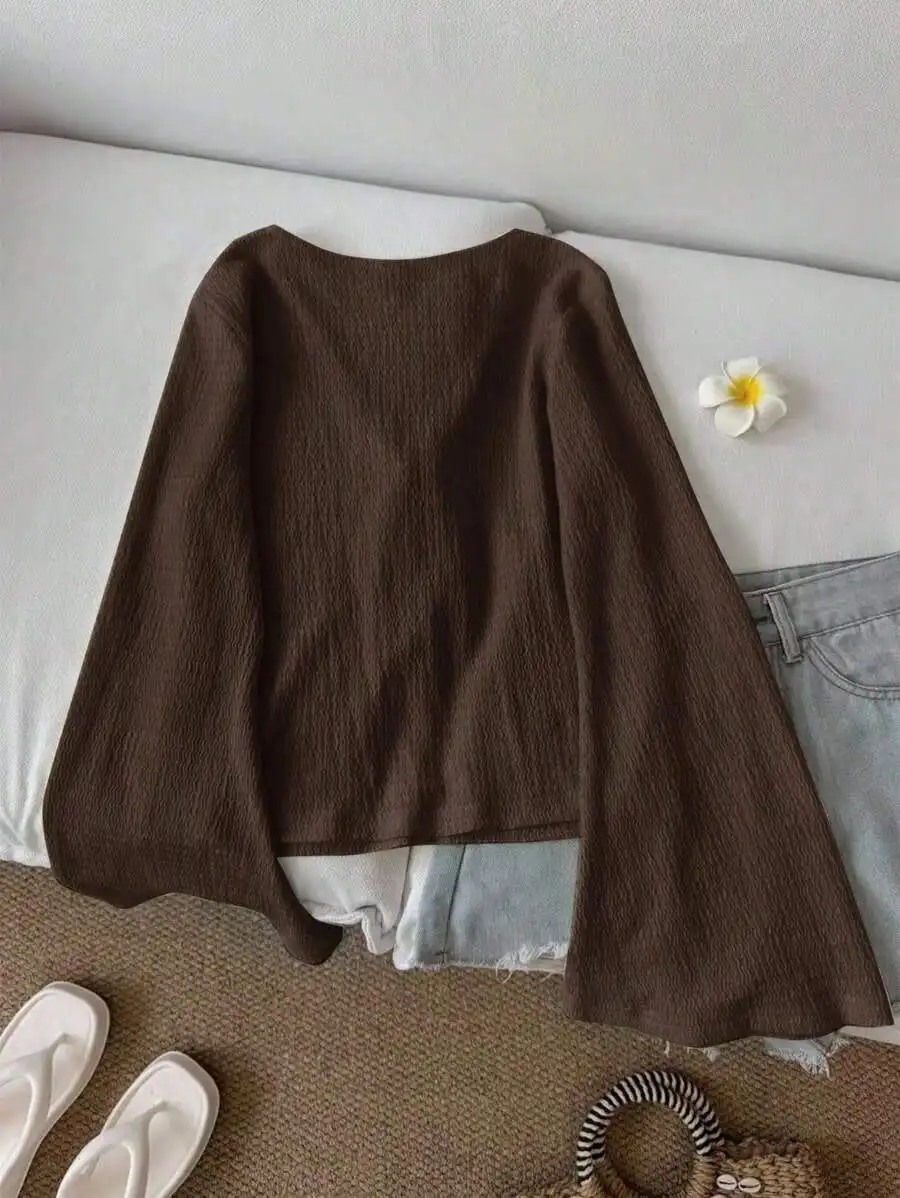 Women's Cardigan Made of Wavy Textured Fabric. It Features V-Neck, Tie Front and Long Flared Sleeves, Stylish and Easy to Match