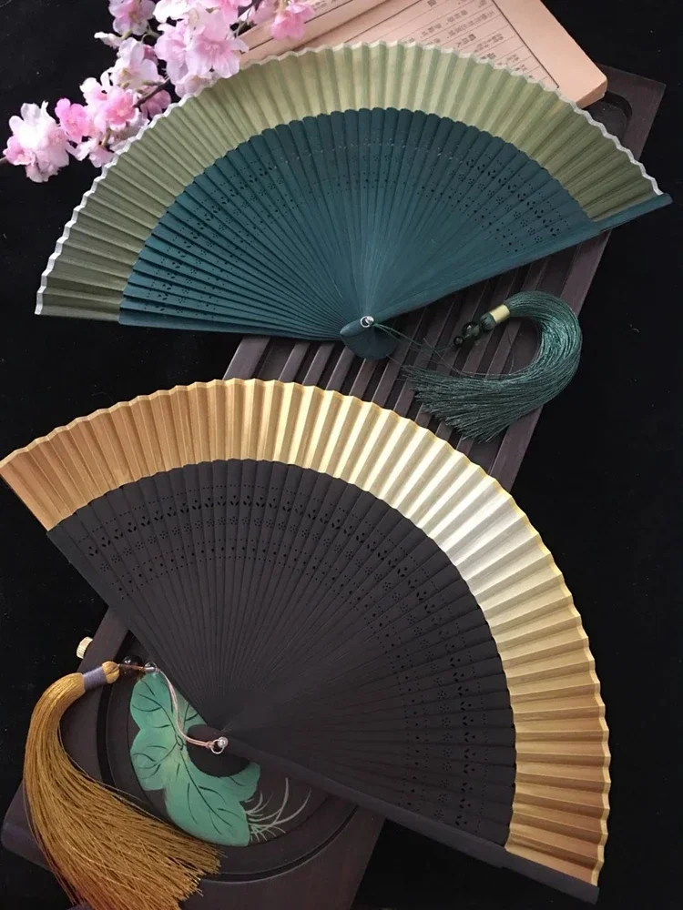 Solid color wedding robe folding fan Chinese style silk female fan small ancient style portable gradient blank fan golden green