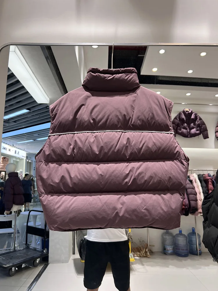 Women's short style stand collar down jacket vest 2025 winter new fashion design loose white duck down jacket trend