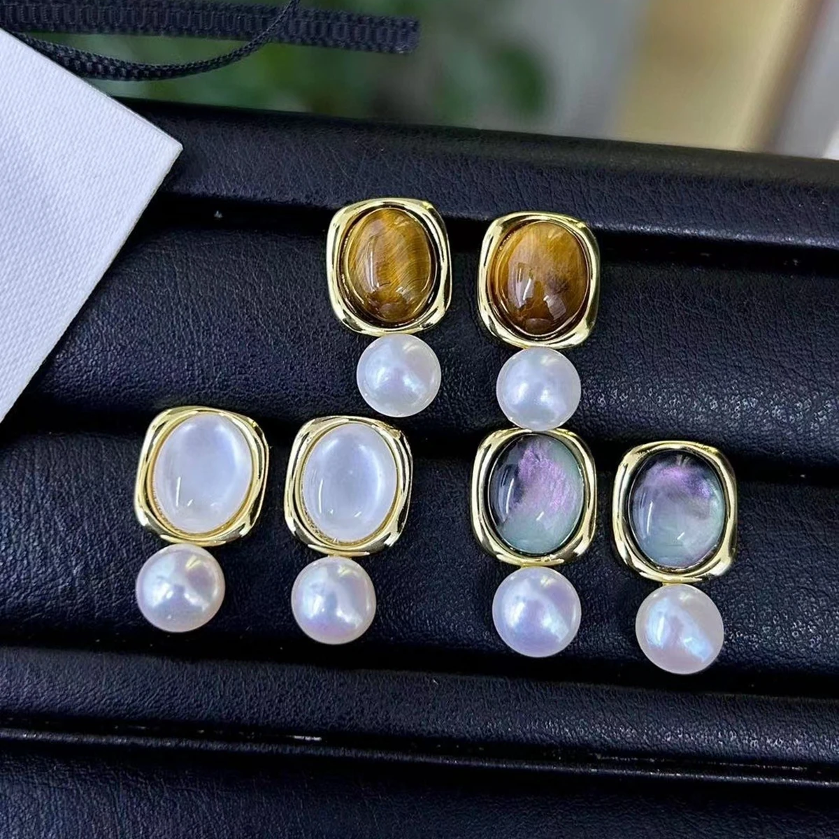 

Fashionable Retro Caramel Amber Cat Eye Stone Paired with Natural Freshwater 7-8mm Pearl Sterling Silver Earrings