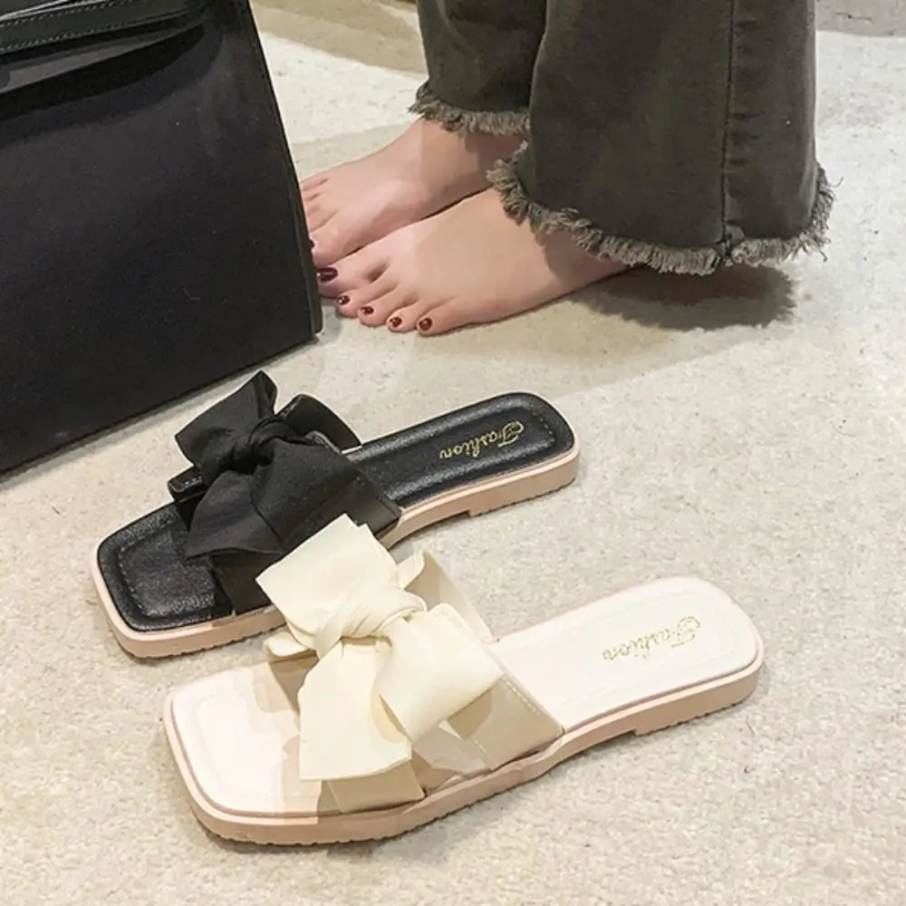 

Fashion Soft Sole Bowknot Slippers Anti Slip PVC Flat Slides Sandals Sweet Beachwear Slippers Women Ladies