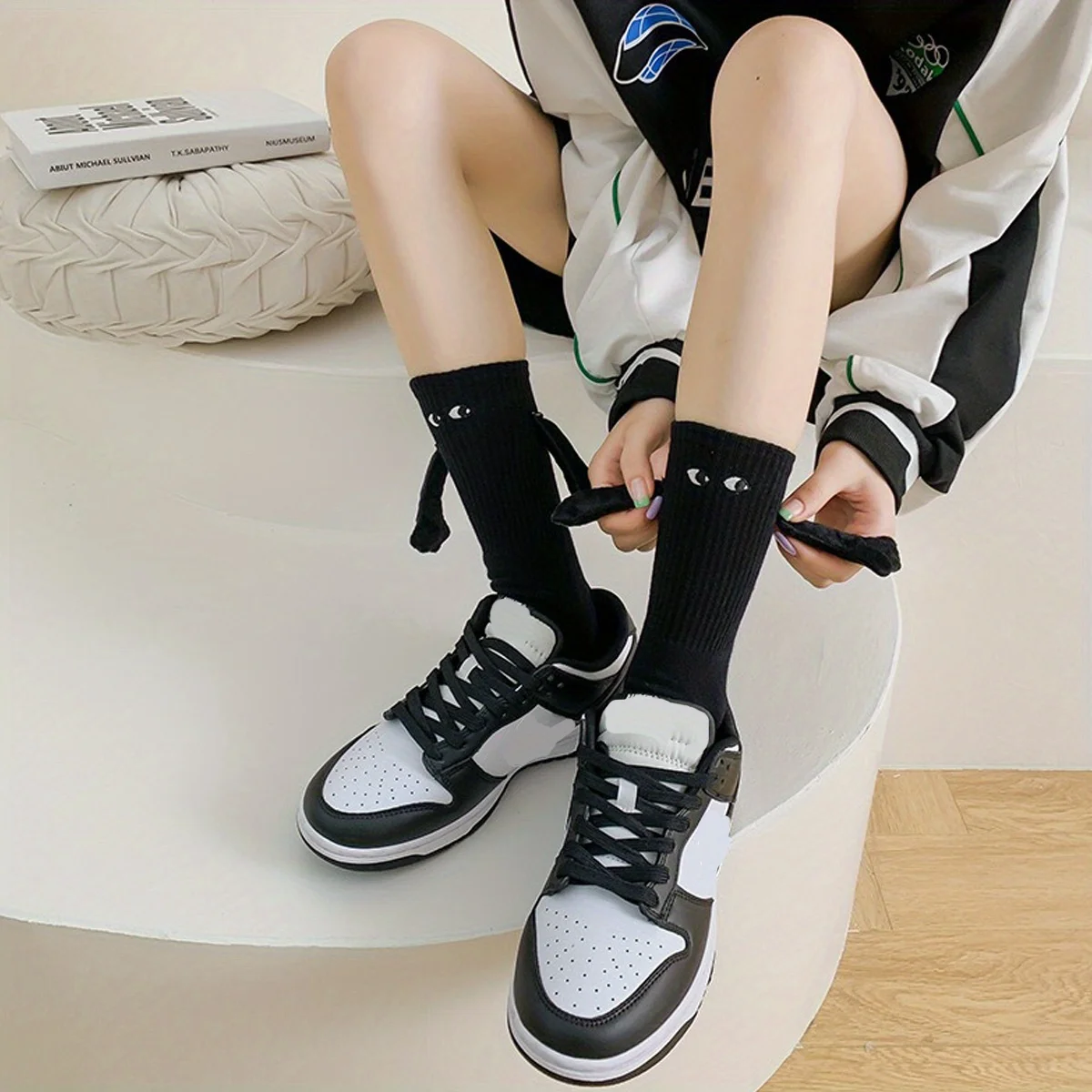 A pair of mid length socks, trendy for both men and women, magnetic attraction, super personality, 3D dolls, black and white ero