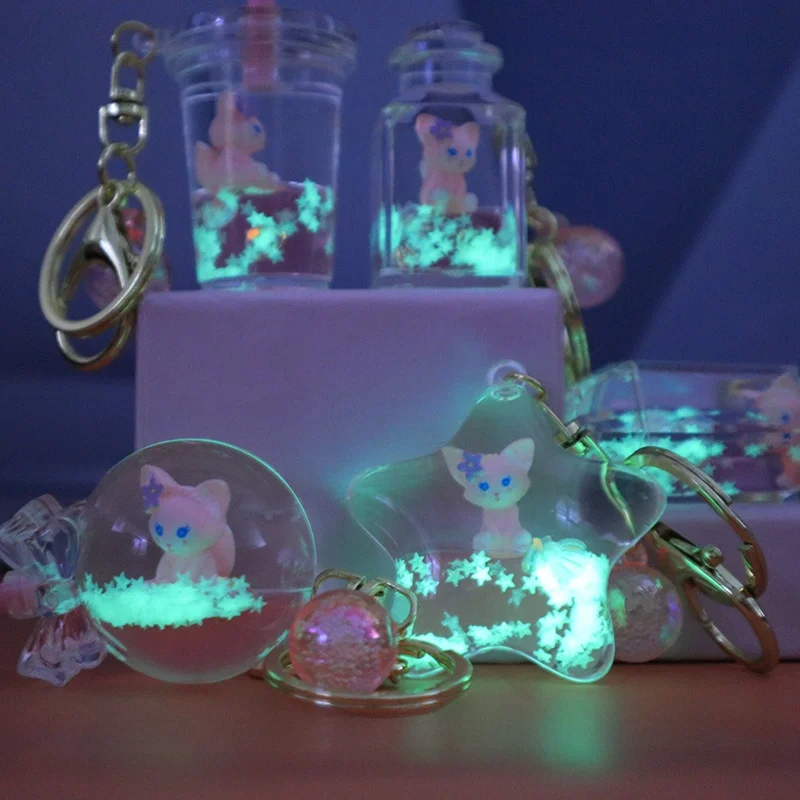 سلسلة مفاتيح كرتونية إبداعية ولطيفة لشخصية لينا بيل، تطفو في سائل زيت ورمل، زينة معلقة، هدية عيد ميلاد، مصنوعة من مادة الأكري...