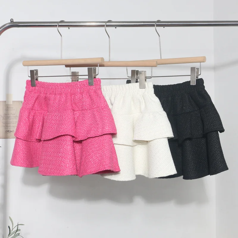 

Женская пышная юбка из твида с эластичной резинкой на талии и надписью A