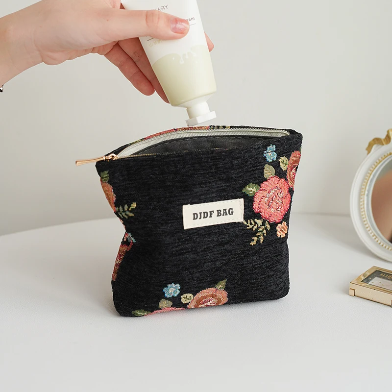 Borsa per il trucco da donna con design a cerniera nera borsa per la conservazione dei prodotti per la cura della pelle per piccoli cosmetici borsa