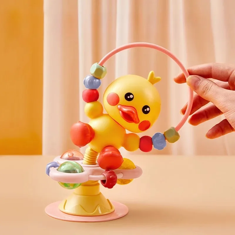 كرسي الطعام، أكواب شفط، ألعاب موسيقى دوارة، قبضة ألغاز التعليم المبكر، خشخيشات للأطفال البطة المهدئة بعمر 0 سنة واحدة