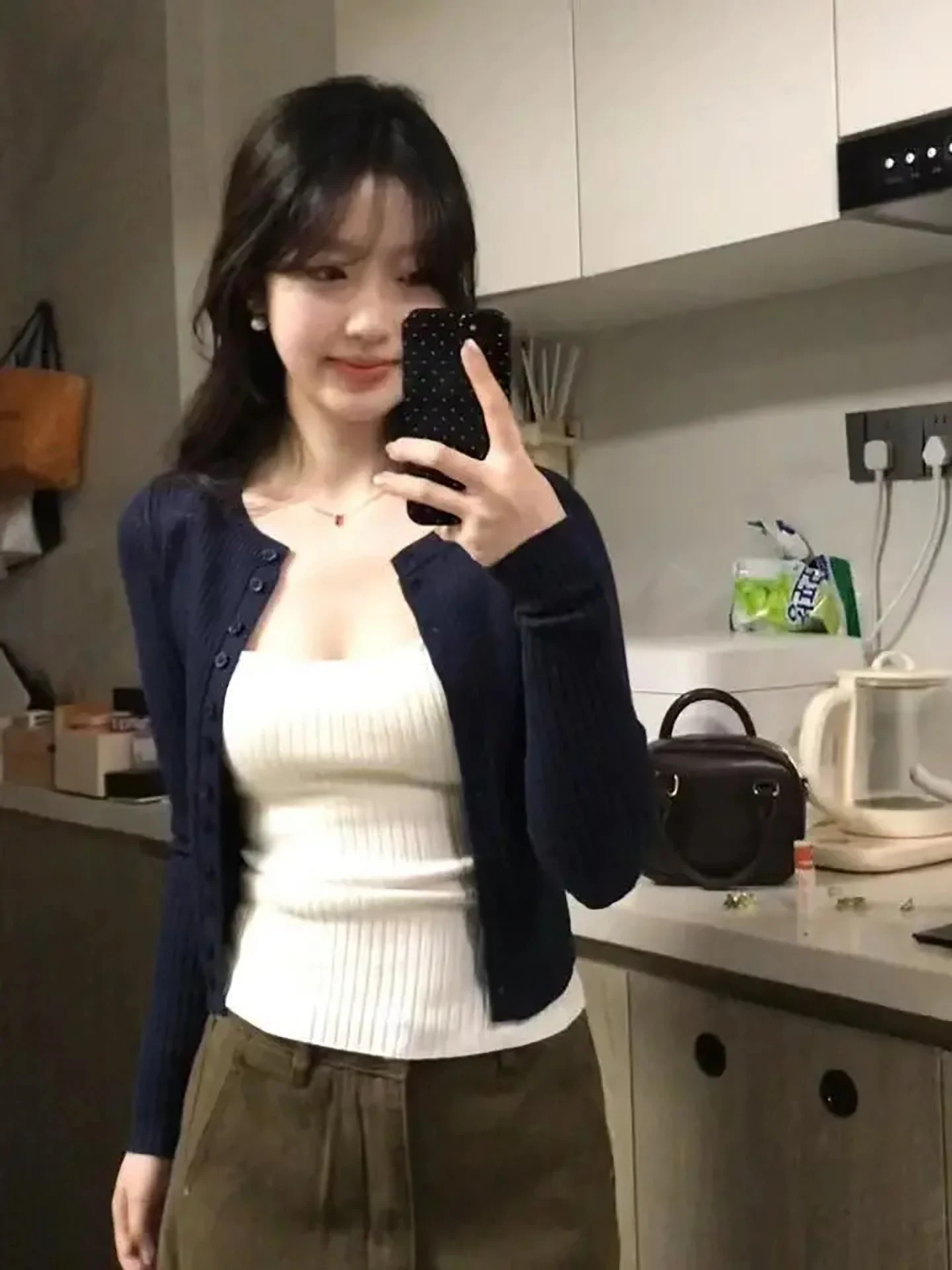 طقم مكون من قطعتين باللون الأزرق الداكن للنساء لربيع 2026 سترة ركاب بسيطة مفتوحة سترة داخلية بدون أكمام مجموعة اتجاه الكلية