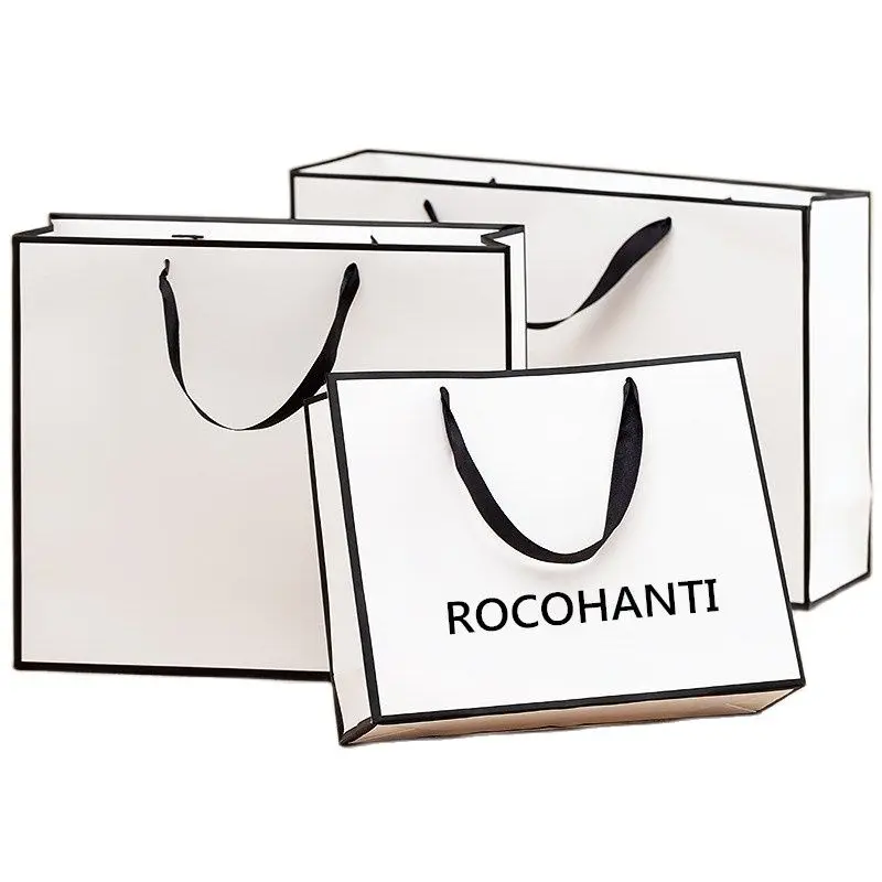 

50 шт., роскошные ленты с принтом логотипа, черный край, персонализированные белые картонные бумажные подарочные пакеты для покупок для малого бизнеса