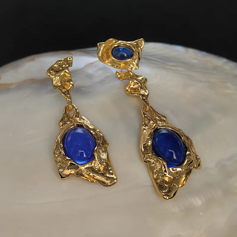 

European and American retro inlaid blue gemstone asymmetrical earrings