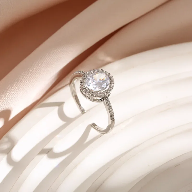 Classic pigeon egg engagement opening ring for women, simple and slightly set zircon diamond ring 9527