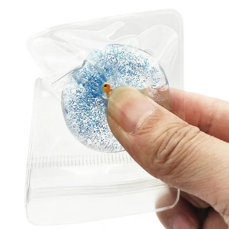 Ocean Planet Squishy Fidget Toy Morbido e carino Piccolo pesce rosso Pizzico Giocattolo di decompressione Pianeta Paillettes Giocattolo anti-ansia per i regali dei bambini
