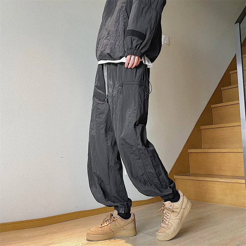 

2023 New Autumn Fashion Men's Loose Casual Leggings Outdoor Waterproof Assault Pants Street Black Overalls Men Clothing