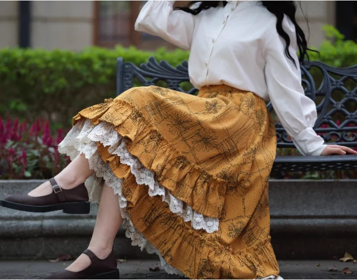 Autunno Inverno Moda Retro Velluto a coste Colore zucca Dolce pizzo Stampa Gonna Ragazza Versatile Riduzione dell'età Ruffles Gonne irregolari