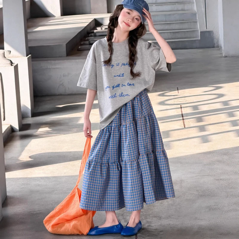 

Girls' Summer Outfit Set2026New stylish short-sleeve shirt for older childrenTChildren's plaid shirt and skirt two-piece set