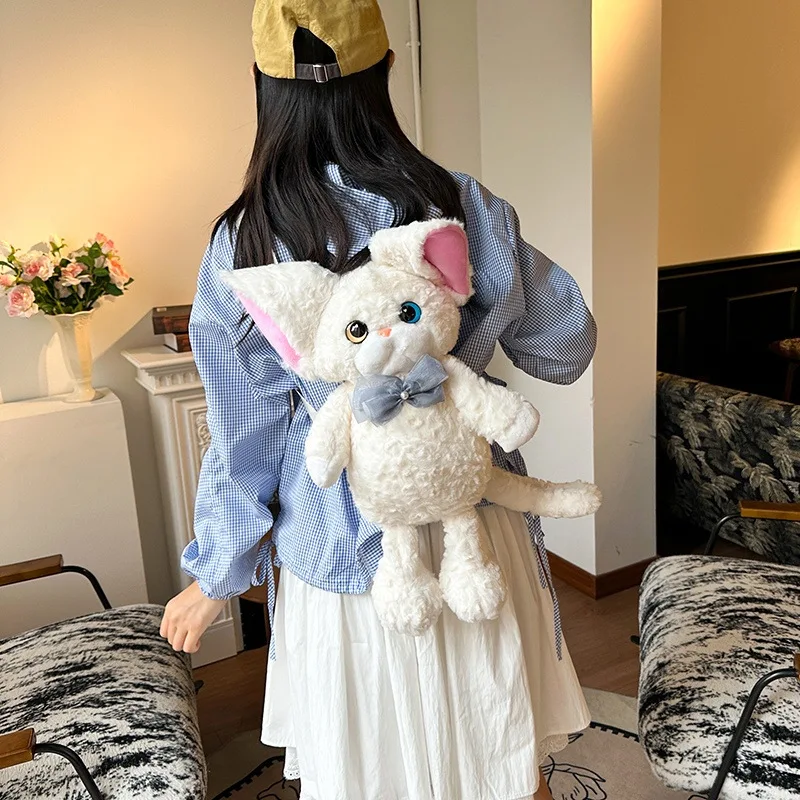 ตุ๊กตาแมวการ์ตูนขนนุ่ม ของเล่นใหม่ น่ารัก แมวเดวอนขนหยิก กระเป๋าเป้สะพายหลังตุ๊กตาแมวสุดสร้างสรรค์ กระเป๋าสะพายไหล่ตุ๊กตาแมว ของขวัญวันเกิดสำหรับเด็กผู้หญิง