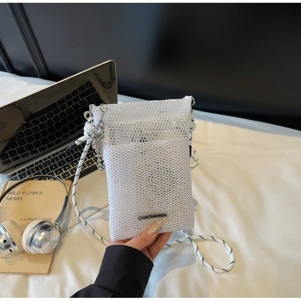 Portafoglio coreano alla moda in rete di nylon tinta unita borsa a tracolla per adolescenti borse a tracolla borsa per cellulare cava unisex